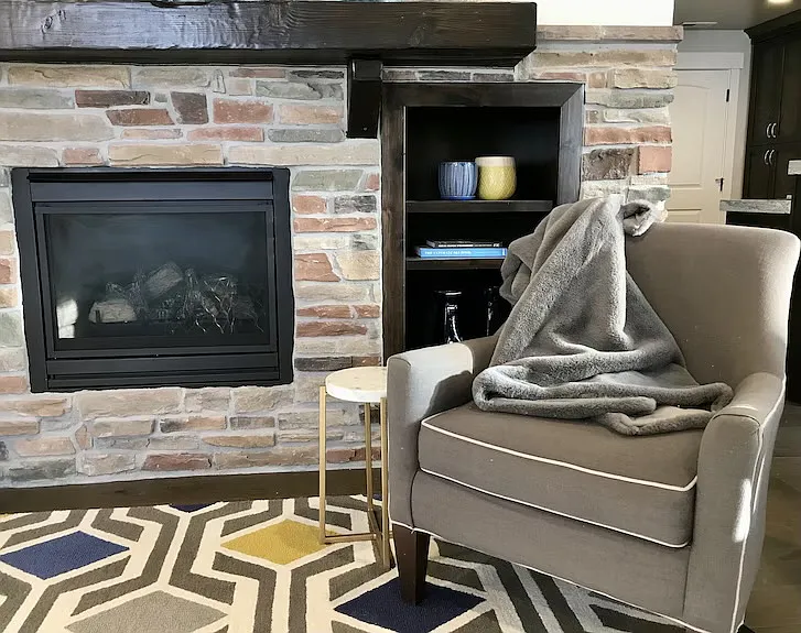 Built-ins surround the fireplace.