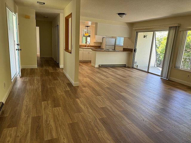 Very spacious entry, living, and dining room area. It will accommodate a large amount of furniture such as a sectional