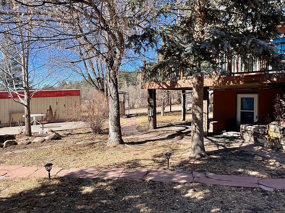 Back yard and unit entrance.