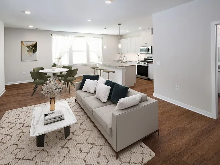 Design Collection I (North Building) Kitchen, living, and dining areas with hard surface flooring throughout