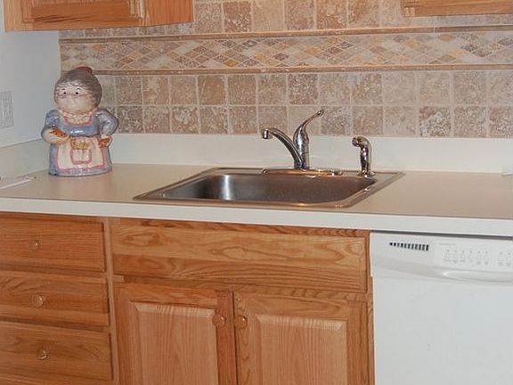 All New Floors, Appliances, Tumbled Marble Backspash in Kitchen