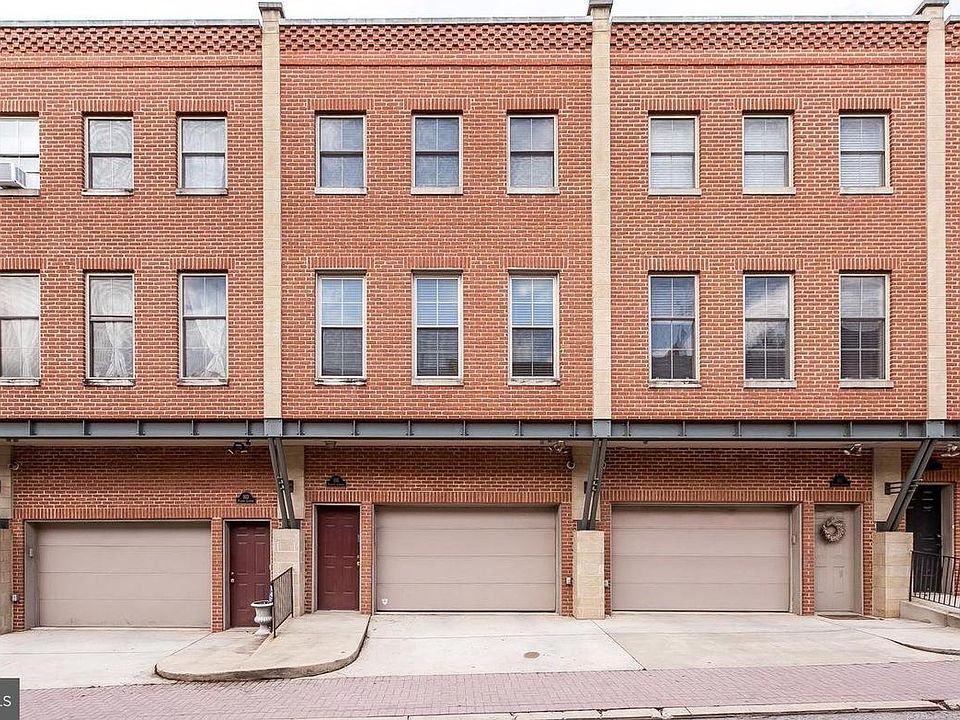 Garage with ample storage and two car parking!
