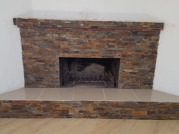 Stacked stone fireplace