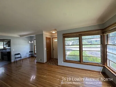 "Charming 3-Bedroom Home with Gleaming Hardwood Floors and 2 Full Baths in Robbinsdale!" — Photo 4