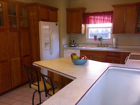 Kitchen with cherry cabinets
