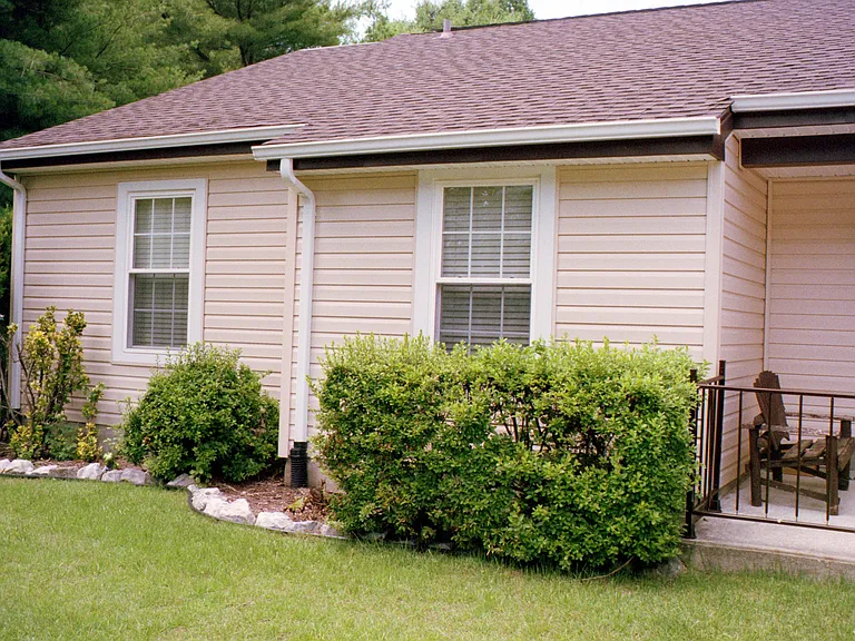 Front of home with partially covered porch!