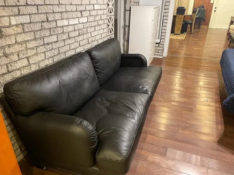 room next to kitchen, dining room. But has a bed at present.