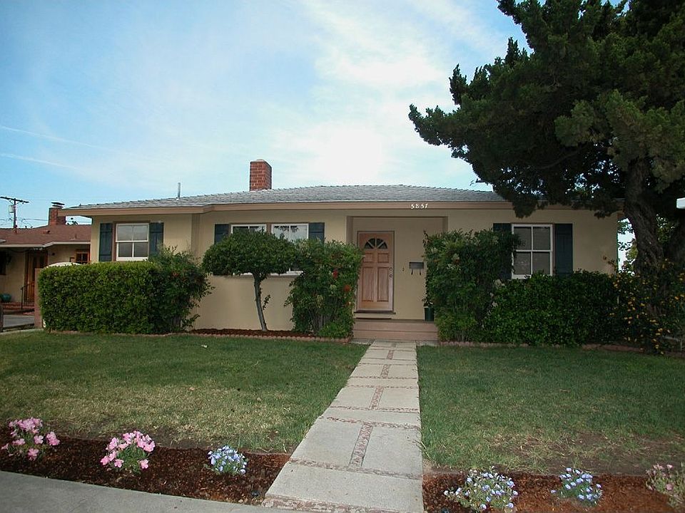 Great curb appeal on tree-lined street
