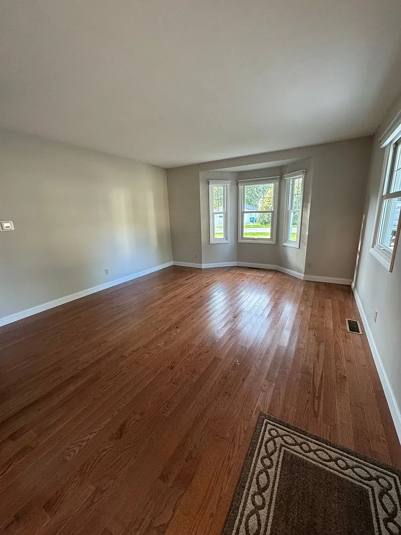 Check out this Charming 3-Bedroom, 1-Bathroom Home with Spacious Backyard — Photo 2