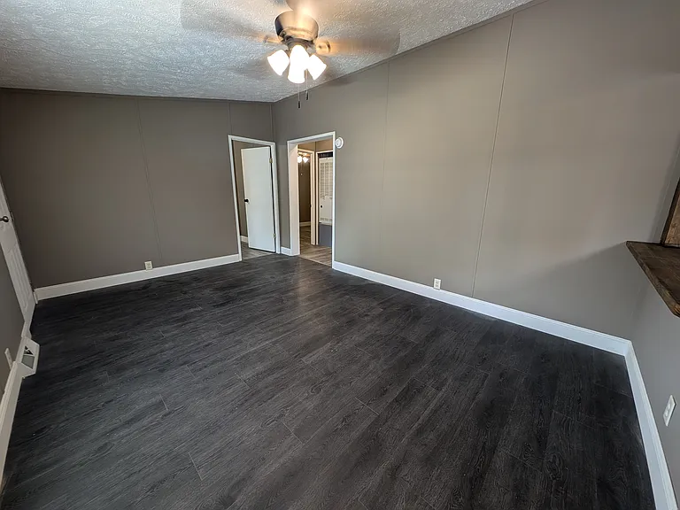 Door to bedroom 3 and Hallway to 2 bedrooms