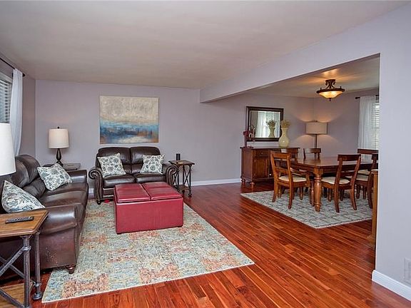 The open concept living room and dining room offers the perfect space for entertaining.