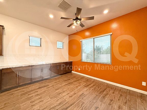 5th image of 9821 E Thornbush Ave