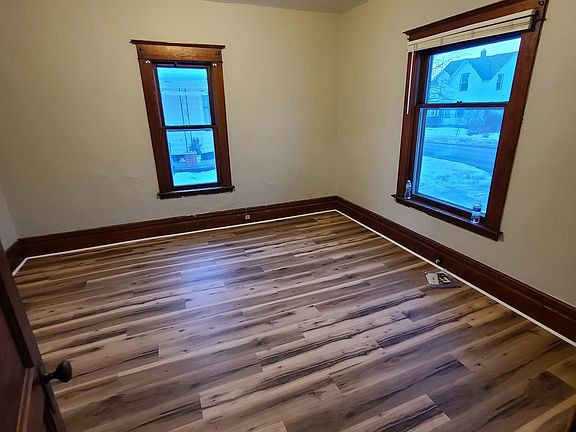 Bedroom 1 (new vinyl flooring, new paint, with closet)