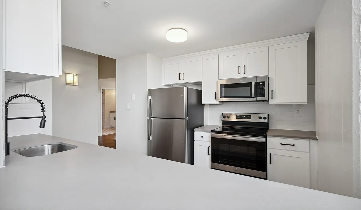 Enjoy your brand new kitchen with upgraded finishes - The Left Bank