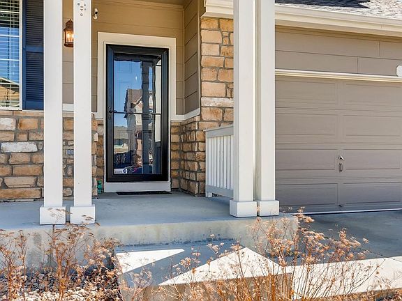 Front porch complete with storm door