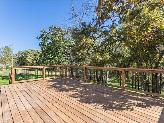 Huge new 14' x 24' deck off kitchen perfect for watching the deer over morning coffee or evening entertaining