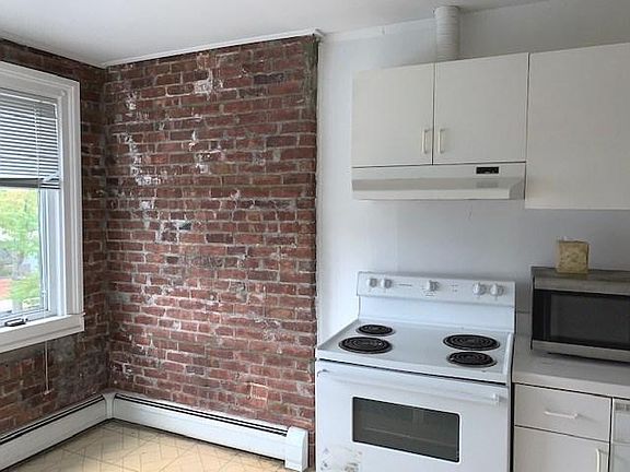 Charming Kitchen w/Exposed Brick