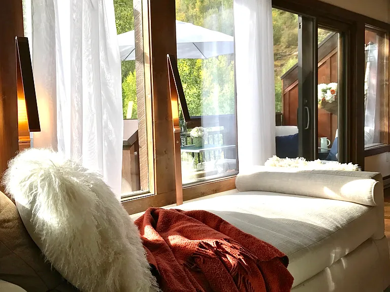 Chase in front of the west facing Living Room windows, it"s the best place to relax after a day of skiing.