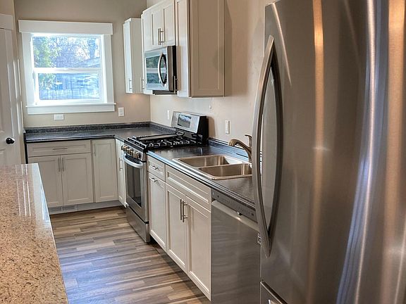 new kitchen with high-end stainless LG appliances, cabinets, countertops