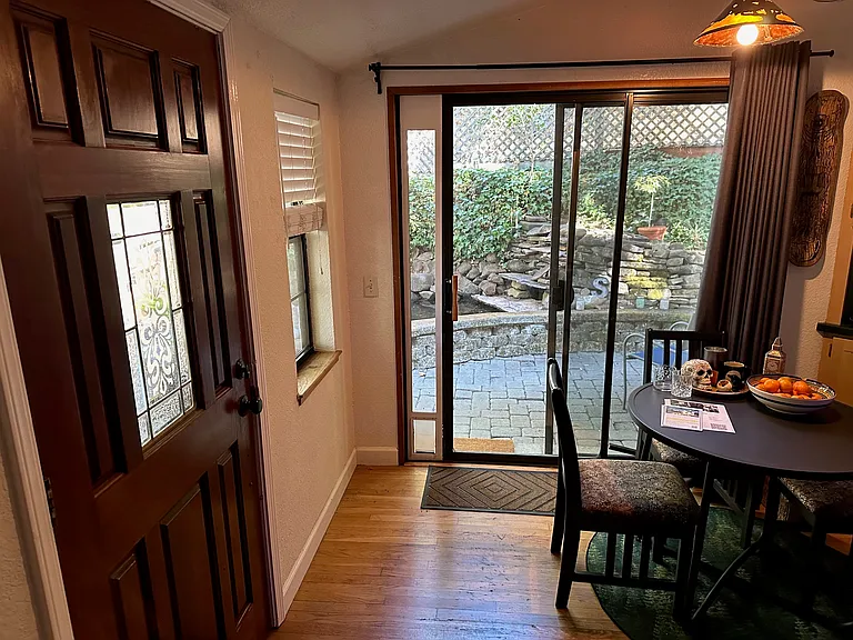 Dining area with a view of garden pond