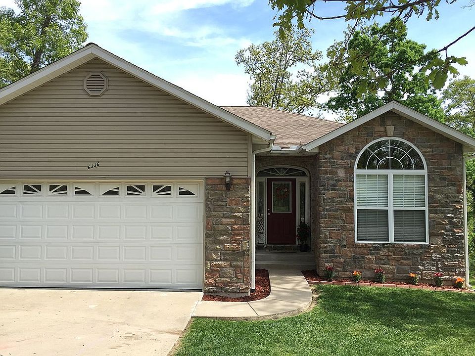 Stone front, landscaped