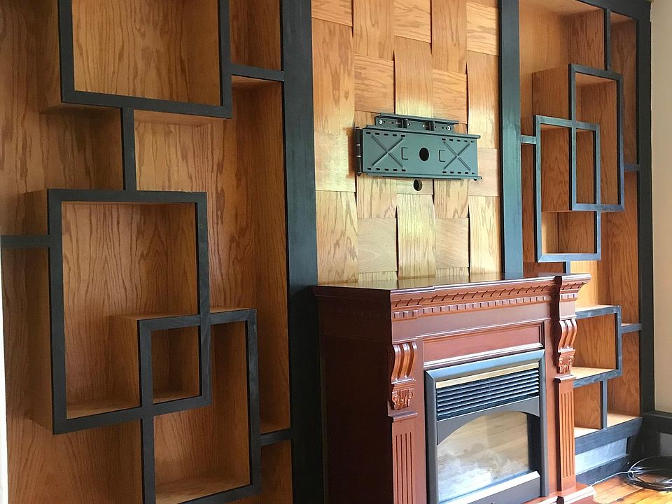 Built in bookcase/display wall with electric fire place
