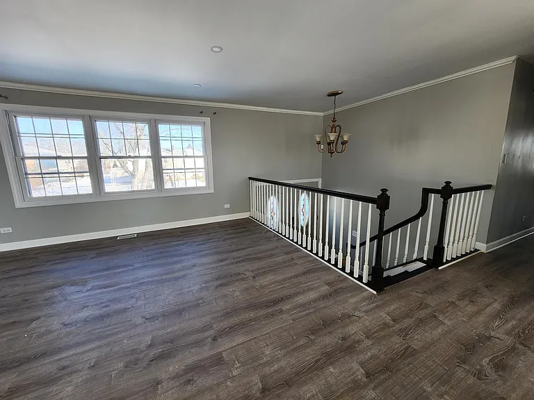 Second Floor: Living room and stairs to downstairs.