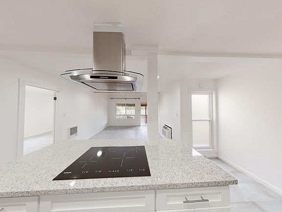 View of the Living room and front door.