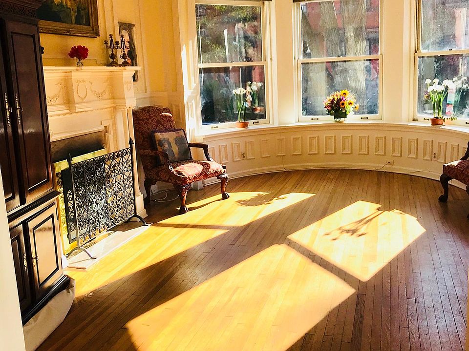 View of beautiful afternoon light in Winter through oversized South-facing windows.