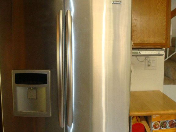 Stainless steel fridge is negotiable