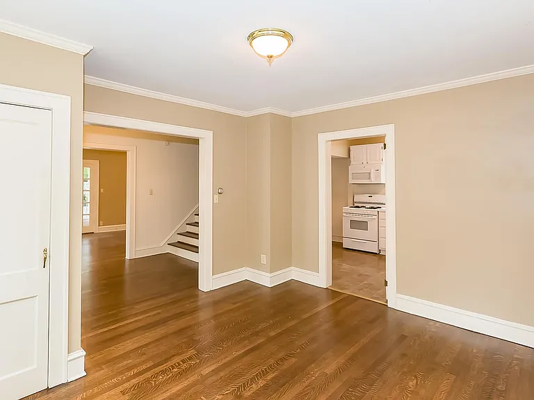The dining room has a closet for dishes or other items. The Hardwood Floors have been refinished throughout the house.