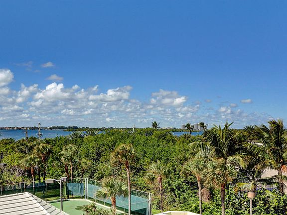 view of tennis court from balcony