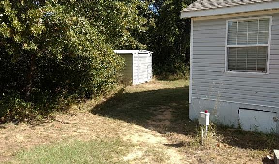 Storage shed behind home