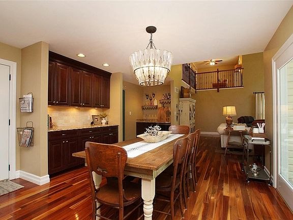 Expansive Breakfast Room Offers Large Butler Pantry Area and Bar Space With Beverage Refrigerator