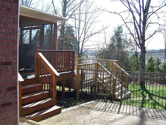 Screened porch, deck, rich iron fencing