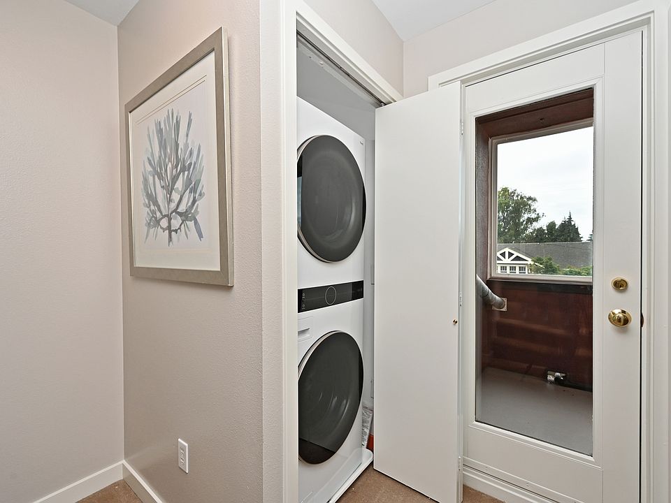 New Washer-dryer on 2nd floor next to large bedroom / office and door to enclosed deck / sunroom