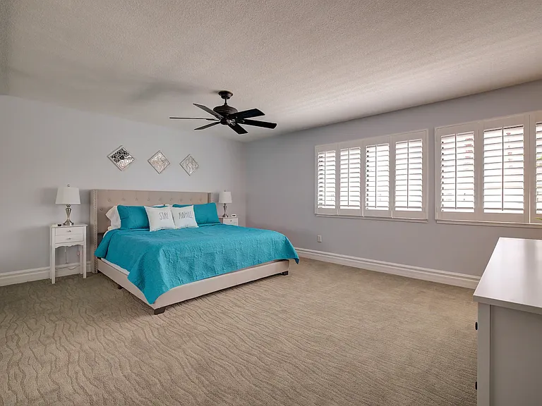 Master Bedroom... King bed, massive closet, lamps contains USB ports for charging cell phone. Pack 'n Play available in master closet.