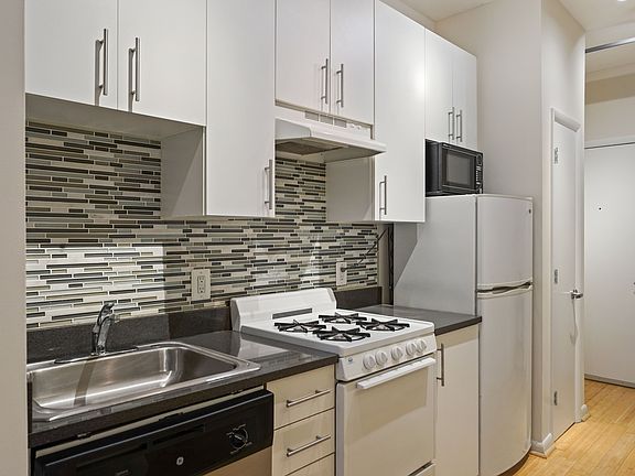 Full kitchen with pots/pans, cooking utensils, silverware, plates, glasses, mugs for 4.