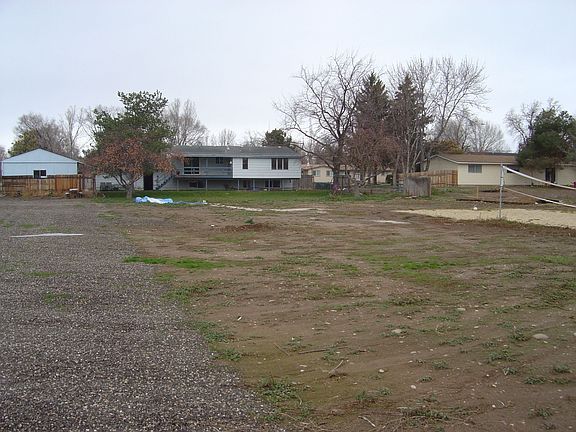 Back yard and volleyball pit