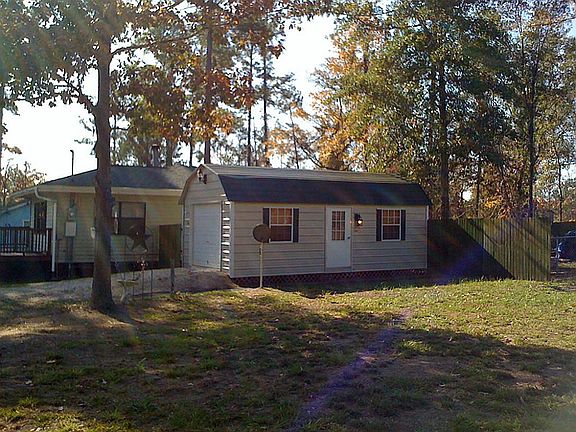 Garage has windows and side door.