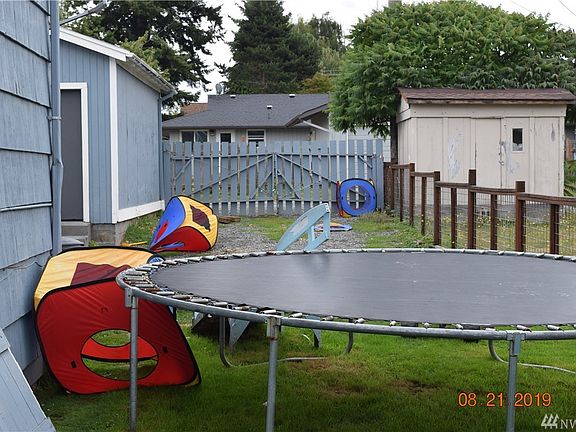 Solid 1 car garage with opener and concrete floor.  Room alongside for boat or RV?