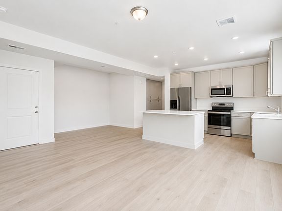 Great room, dining nook and kitchen