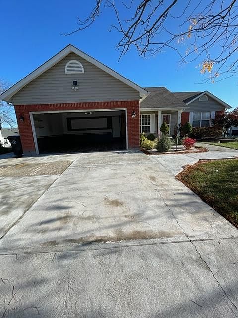 Front of house with 2 car garage