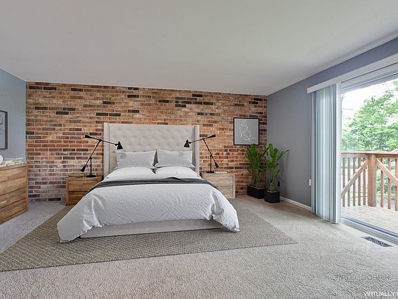Huge Master suite with newer sliding doors to balcony.
