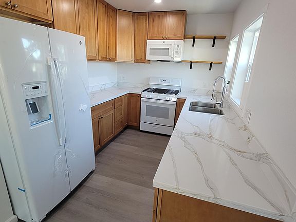 Kitchen, all new GE appliances, ice/water dispenser, gas stove, dishwasher, etc.