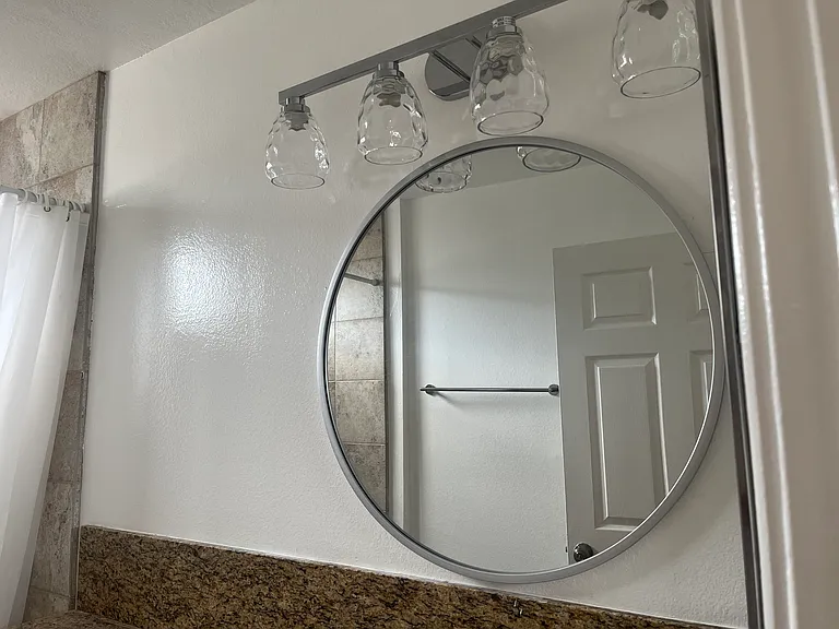 RENOVATED BATHROOM W/ NEW DESIGNER MIRROR & LIGHTING