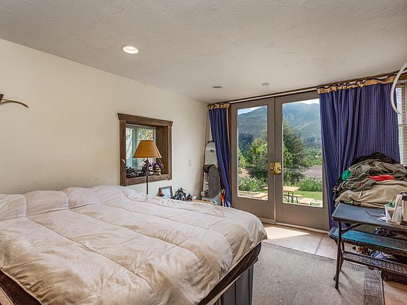 Master bedroom, 12 x 24, with french doors to patio and back yard