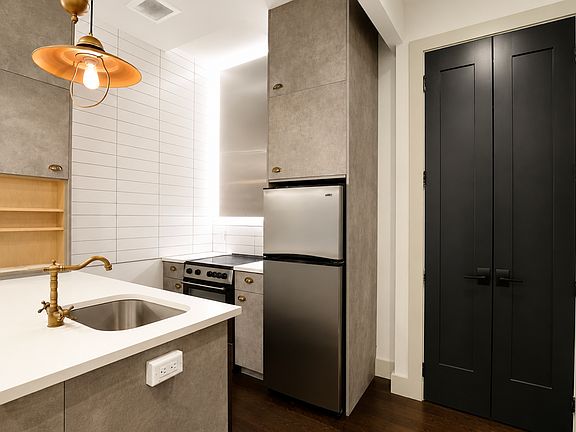 3rd image of 102 Scholes St APT 2F