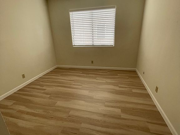 Upstairs Bedroom 1 (reach in closet with sliding wooden doors)
