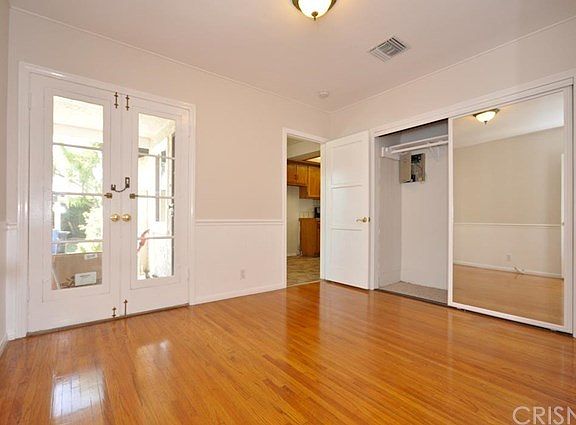 One of three bedrooms